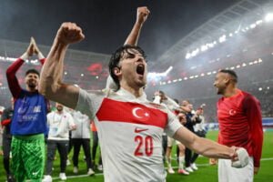 Kadioglu celebrates for Turkey against Austria in the Round of 16.